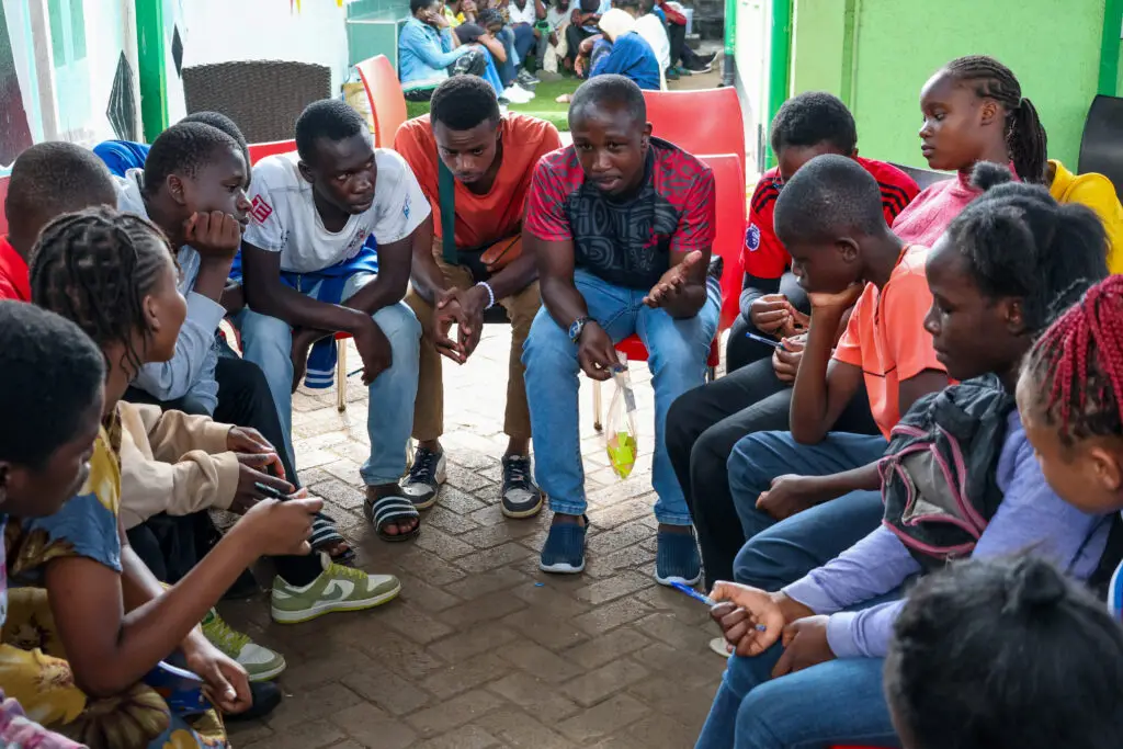 A facilitator in a round-table discussion